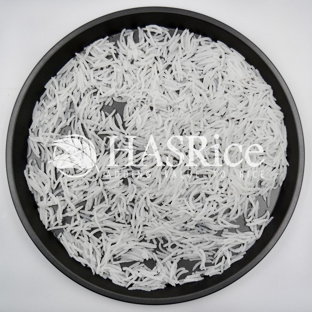 Cooked 1121 Basmati sella with steam rising, showing aroma retention after cooking